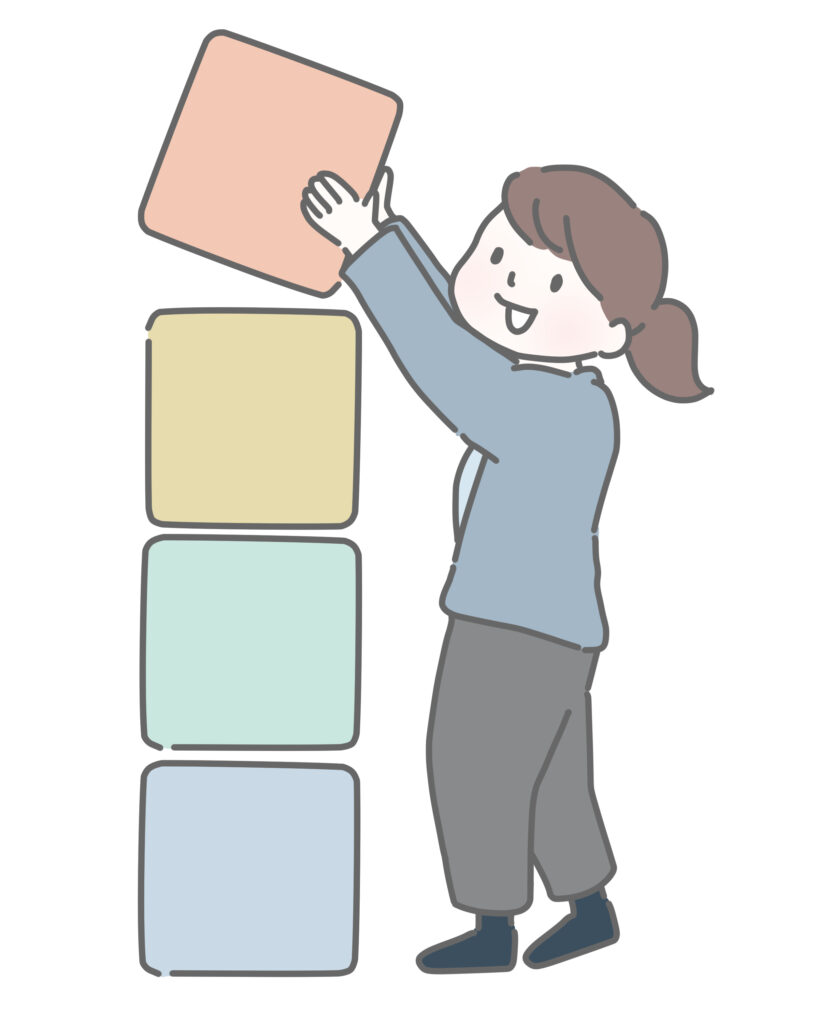 ブロックを積み上げる女性のイラスト